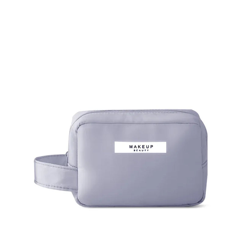 "Travel in Style with our Sleek and Spacious Ladies Portable Cosmetic Bag - Perfect for Organizing Your Makeup Essentials!"